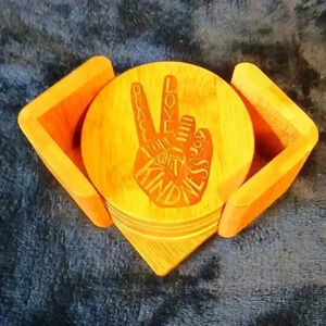 5 wooden coasters..artwork amazing on them. Never used.